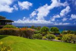 A large grass area off the lanai is perfect for extra room to enjoy the sun